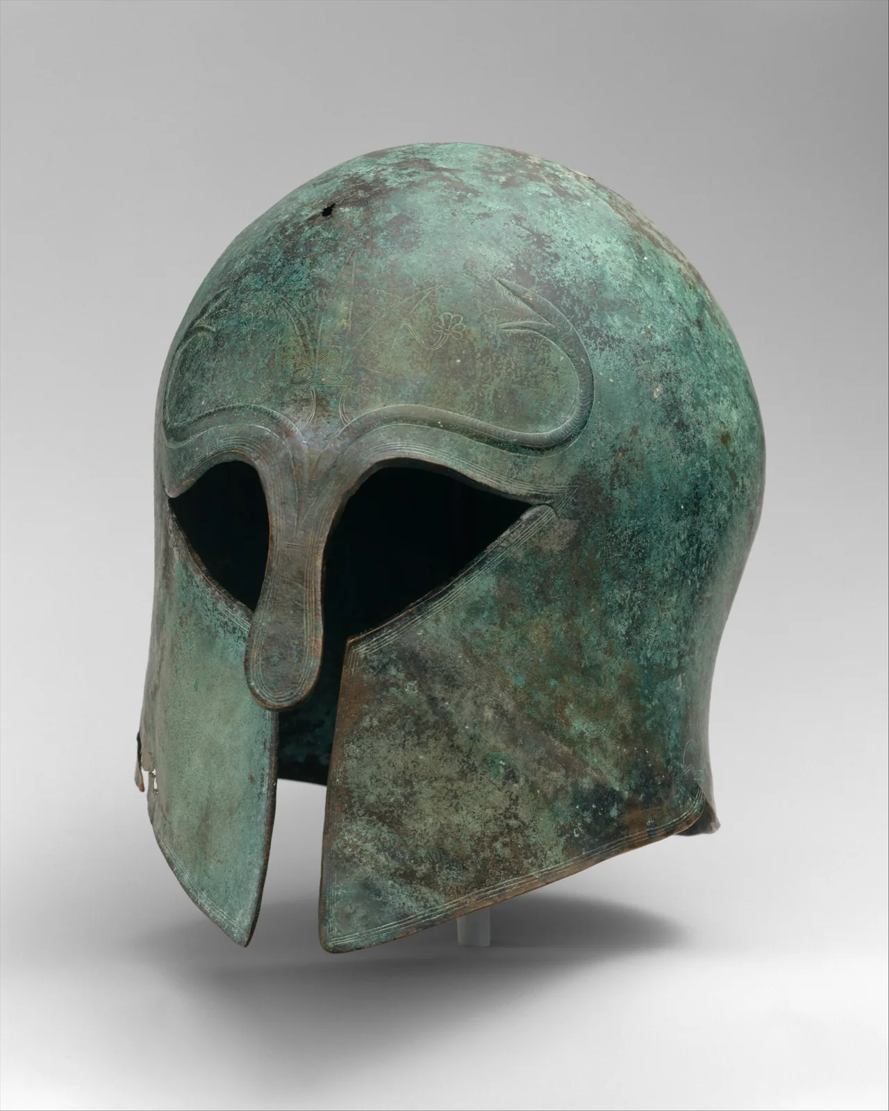 A Corinthian-type helmet. Photograph or reproduction of an ancient artifact.