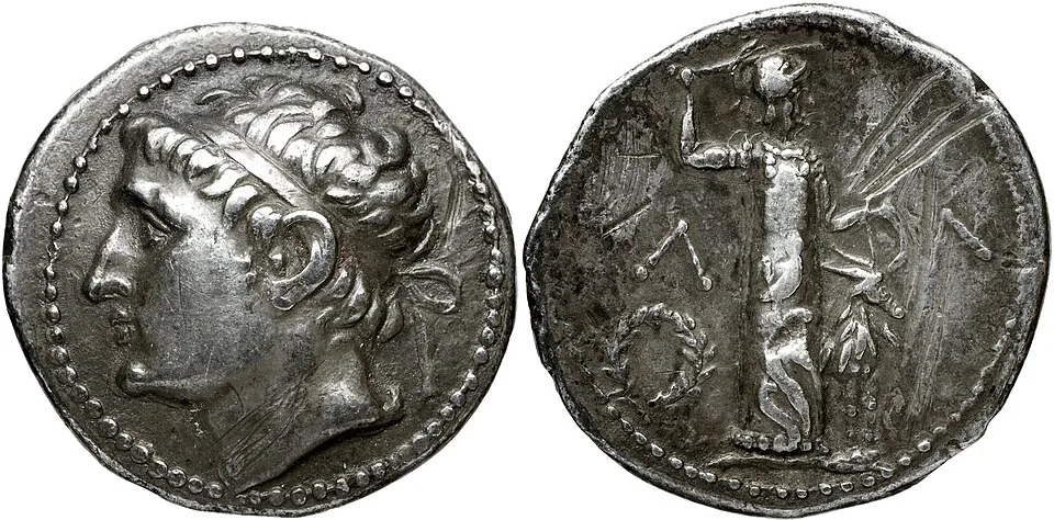 Both faces of an ancient silver tetradrachm issued by Cleomenes III.